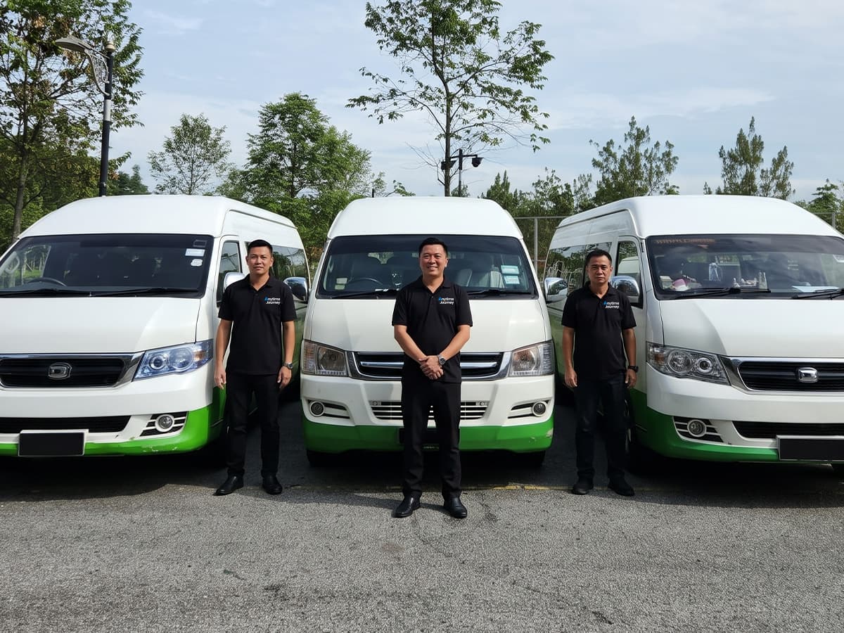 Anytime Journey charter van on a Malaysian road